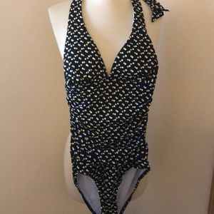 Polka dot barging suit one piece.